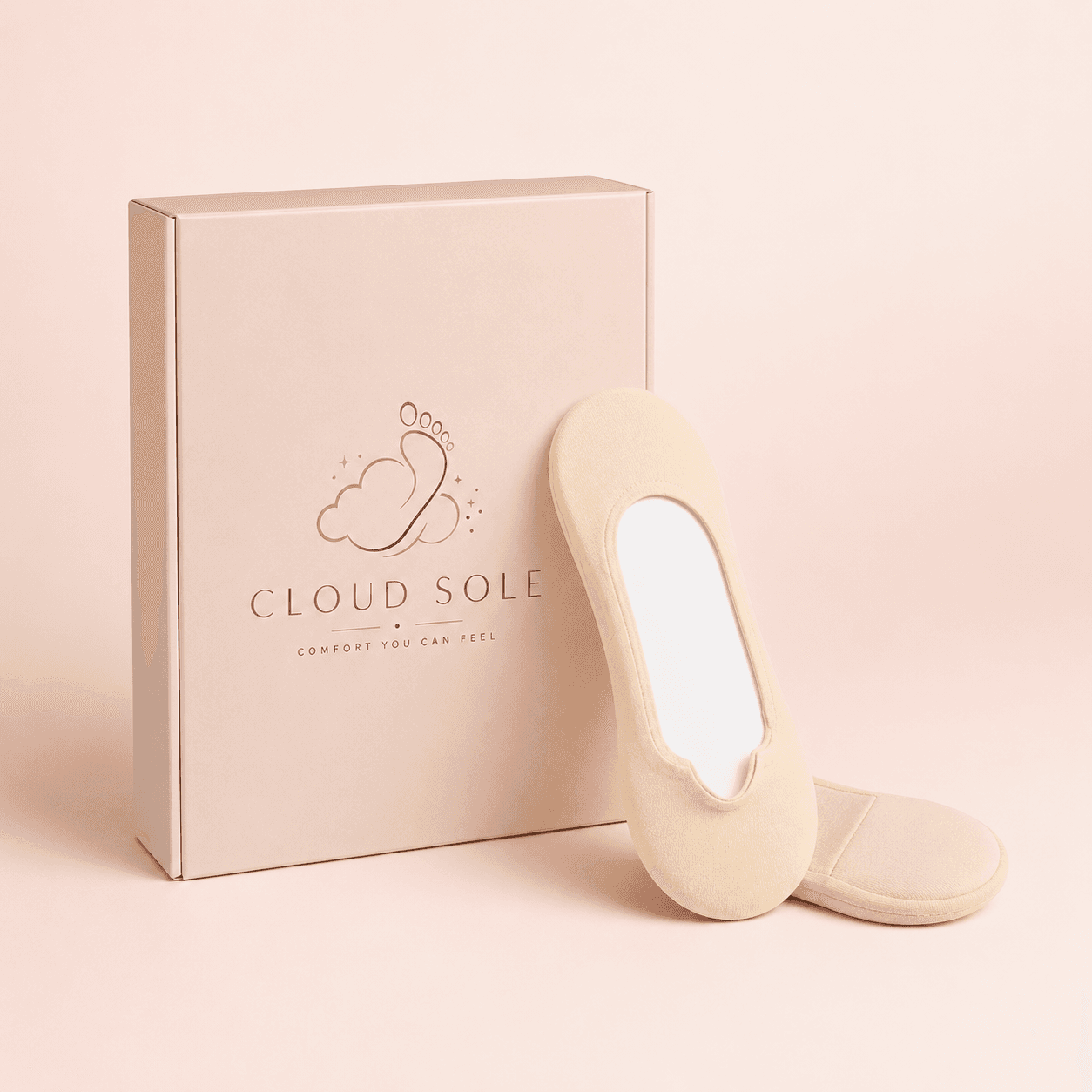 The CloudSole cream no-show socks with product box